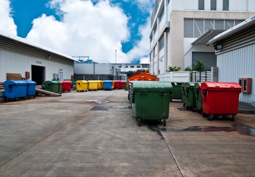 Crew loading a van with mixed commercial refuse
